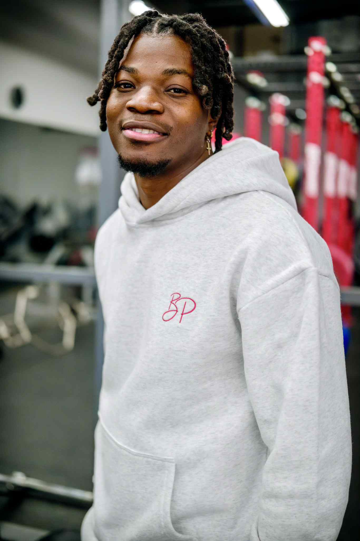 Le hoodie Unisexe gris