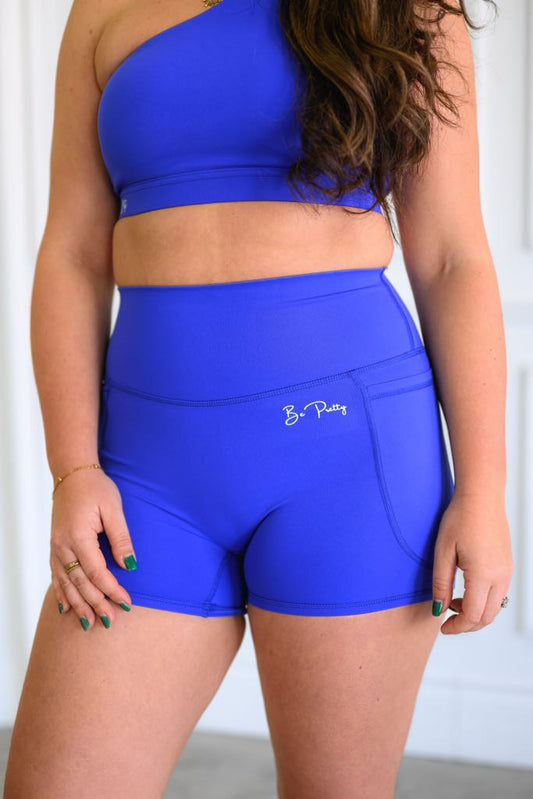 Le biker short Coach Eve bleu Monaco